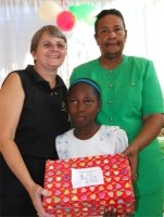 Orphan in the Bon Repos orphanage receiving their Make Jesus Smile shoeboxes 